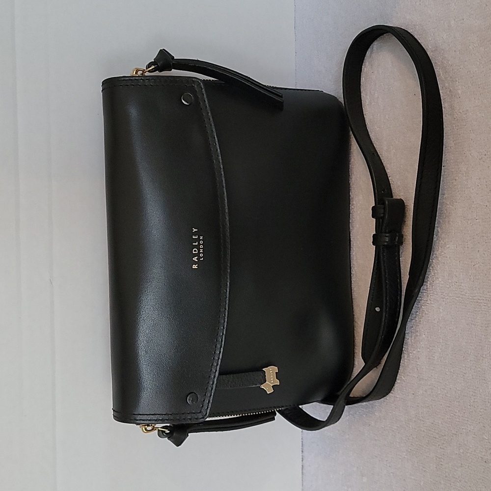 Radley London black smooth leather flapover side expandable handbag
